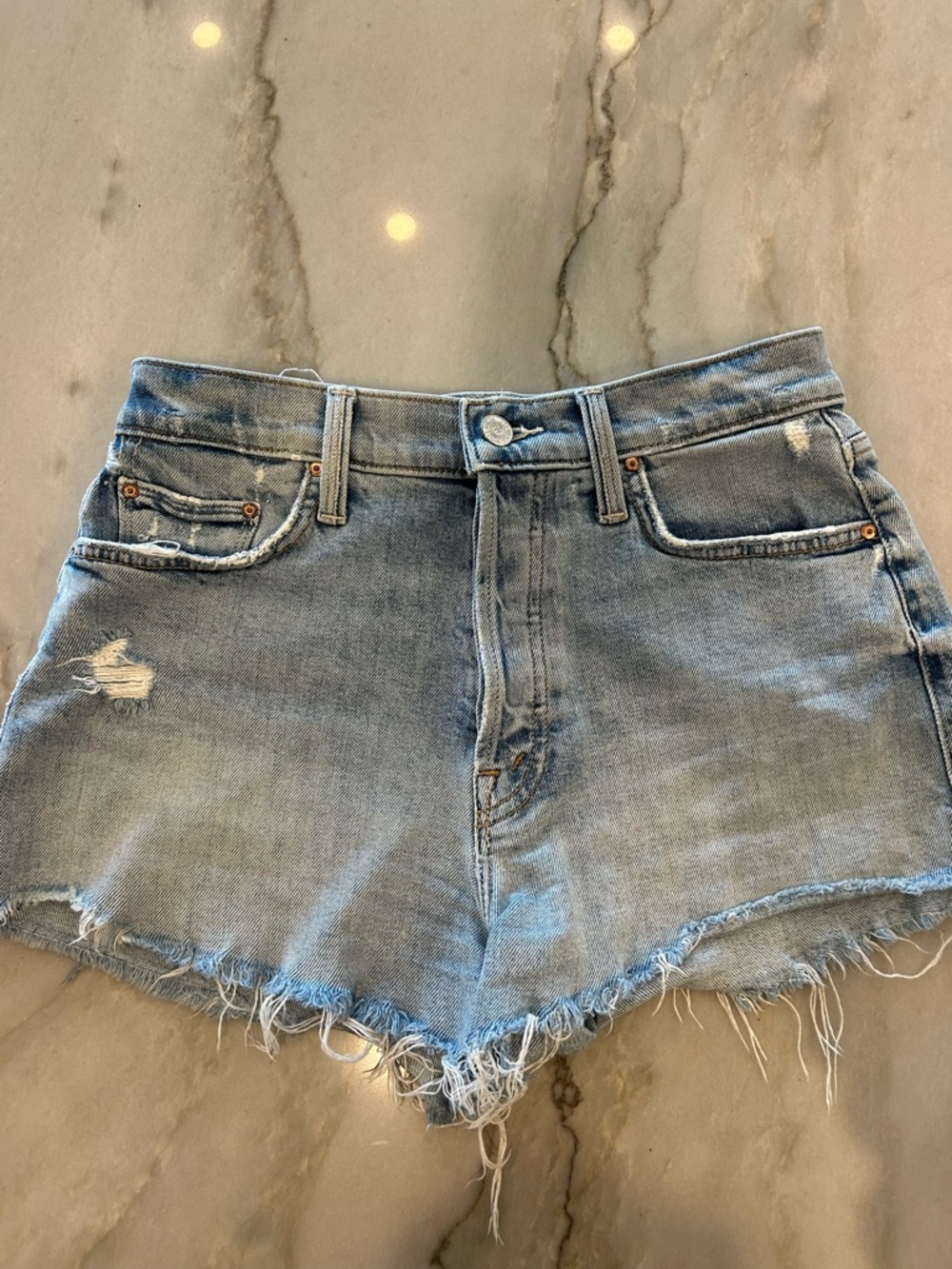 MOTHER light blue denim jeans with tan stitching